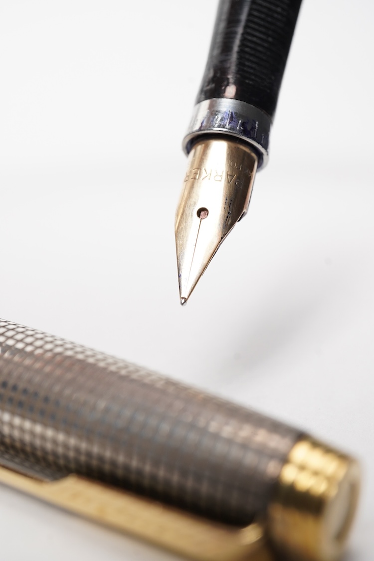 A Parker Sterling silver Cisele fountain pen and matching ballpen in original box along with a collector's pen case